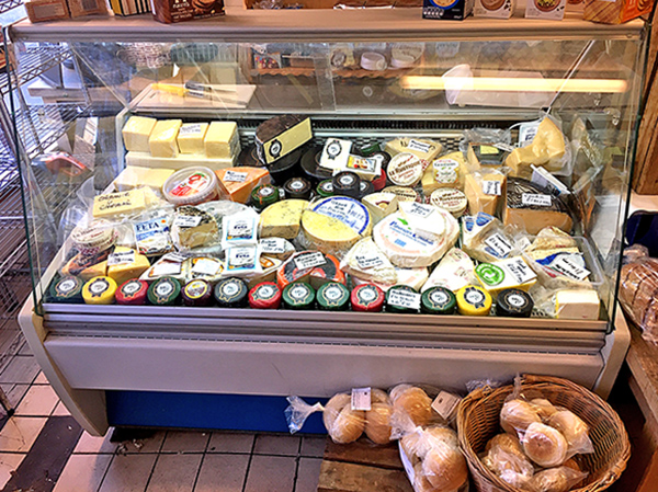Cheese counter at Buntings food store in Coggeshall, Essex